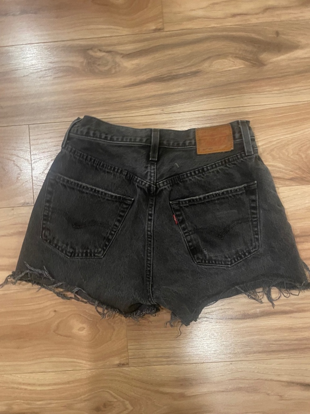 Levi’s black cutoff 501 shorts 27